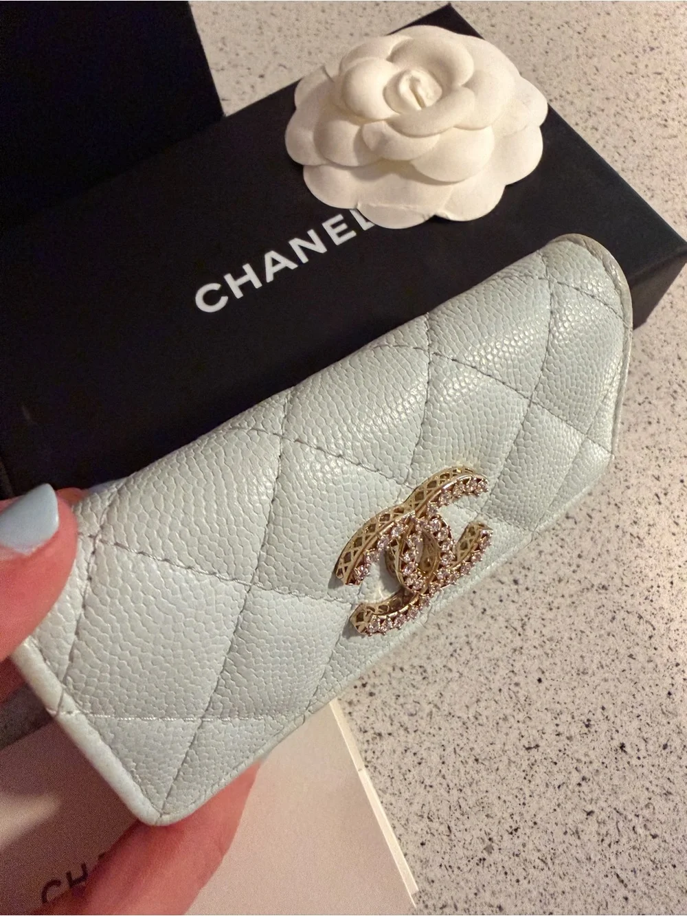 Chanel shiny caviar quilted crystal CC flap card holder light blue